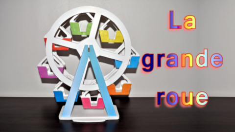 grande roue en carton avec cabines colorées